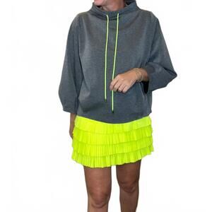 NEW CATCH + CLUB women's tiered skort in neon yellow